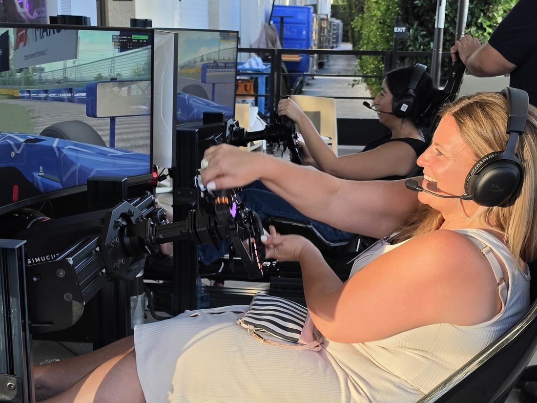A driver mid-session on a Trackside full-motion racing simulator in Irvine, California