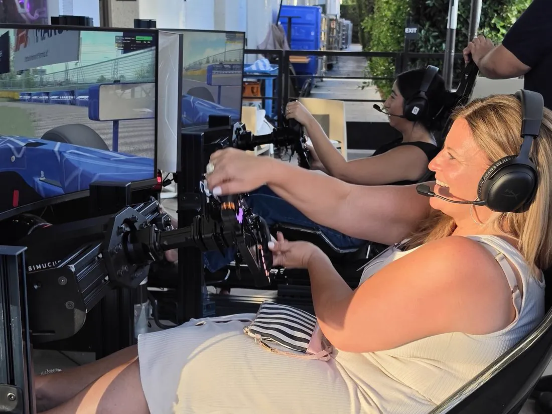 A driver mid-session on a Trackside full-motion racing simulator in Irvine, California