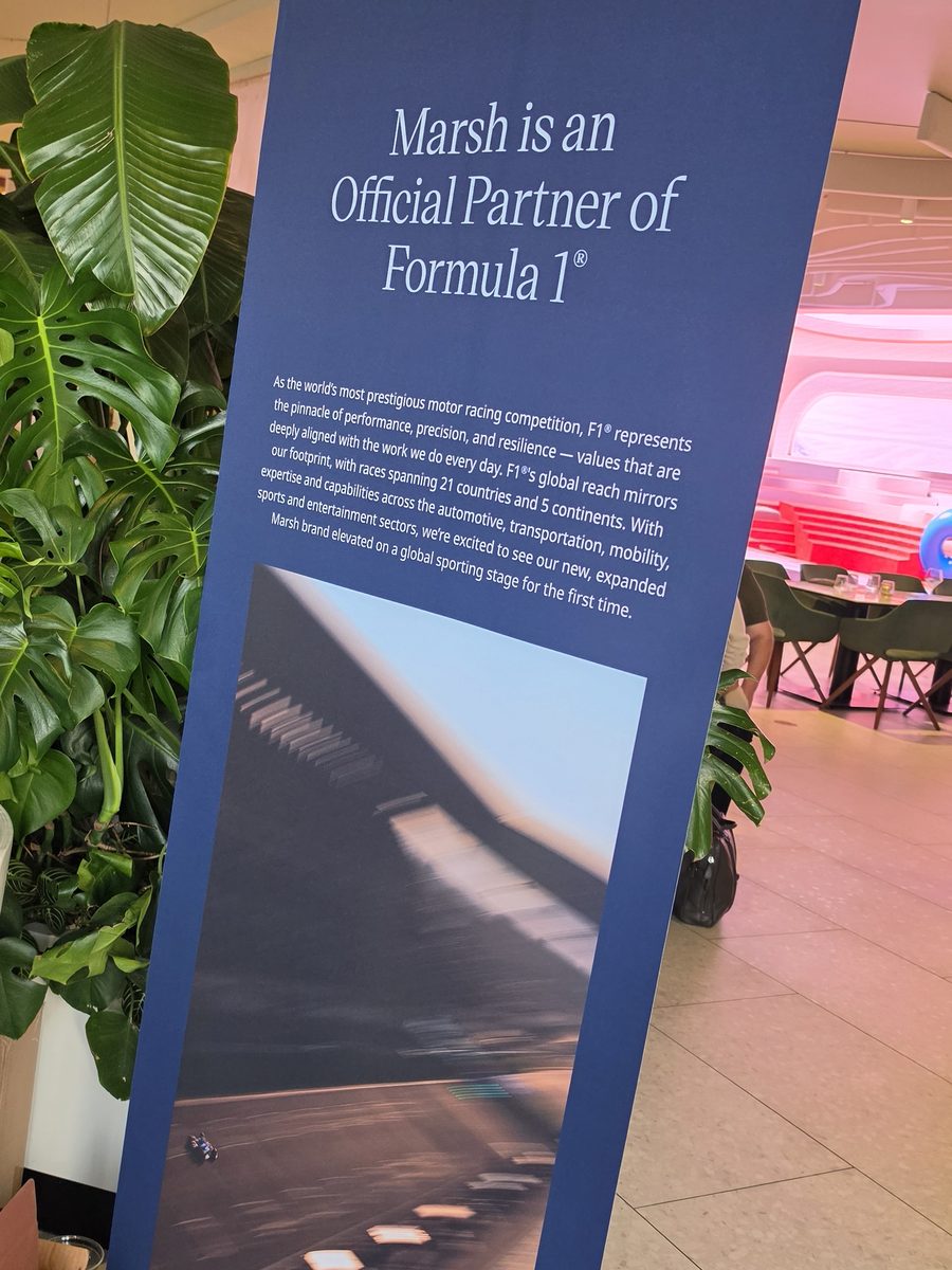 Client event signage at the Mercer reception reading: Marsh is an Official Partner of Formula 1