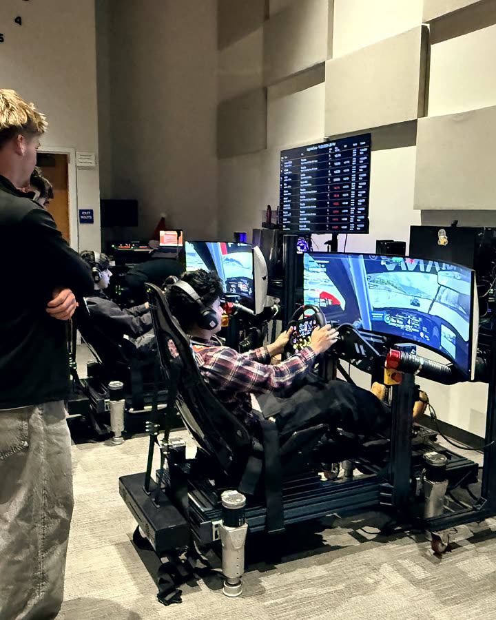 A premium indoor Trackside racing setup with big-screen broadcast